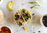 sprouty tacos, tahini garlic sauce tacos, sprouted tortilla tacos, avocado sprout tacos, black bean tacos, healthy plant-based tacos, quick vegan lunch recipe