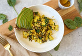 golden turmeric tofu scramble in a pan with mushrooms and spinach, anti-inflammatory tofu scramble with healing turmeric on sourdough toast, easy vegan breakfast tofu scramble with avocado